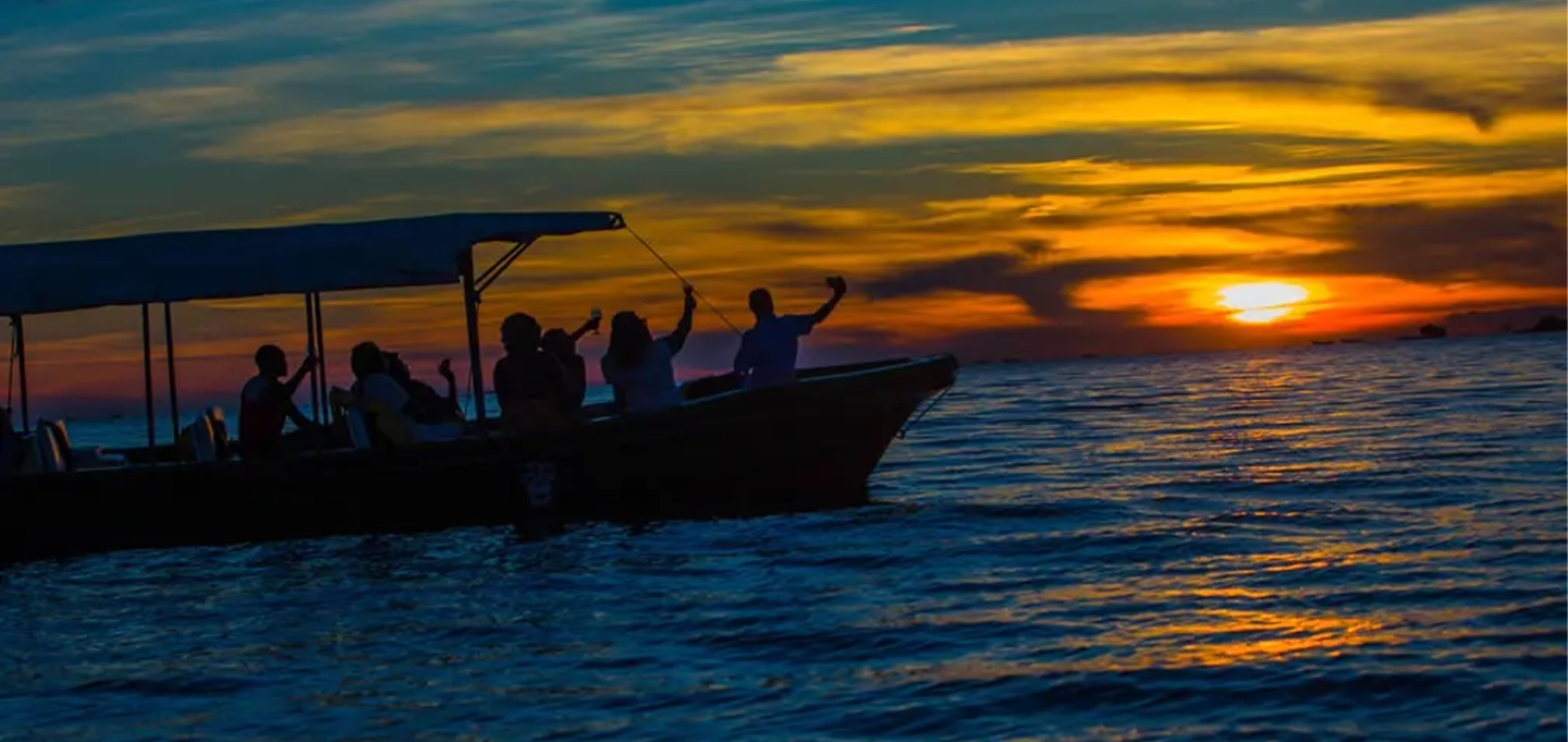 Enjoy a beautiful Lake Victoria sunset boat safari and visit the famous Equator crossing near Entebbe for a memorable Uganda travel experience.